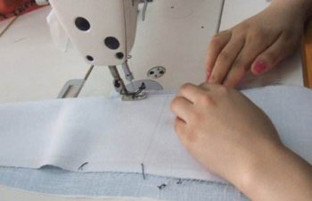 定做工作服生產當中的車縫倒回針有什么用?